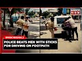 Viral ahmedabad cops flog men in public  beat them brutally with sticks  drunk  drive case