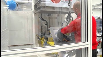 Helium Technology -  Leak test machine for fuel tank with rotary table