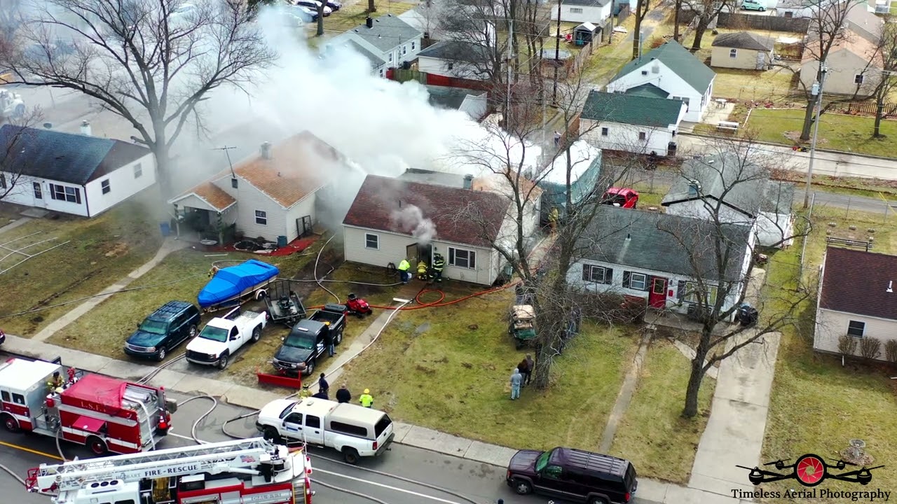 Neighbors Helping Put Out House Fire Lake Station, Indiana Drone