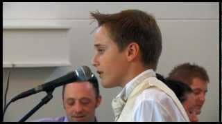 12 year old boy singing 'Father and Son' at brother's wedding.