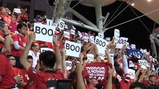 Disregarding warnings from their team’s governing body, hong kong
fans boo the chinese national anthem at tuesday's world cup qualifier
game against china. s...