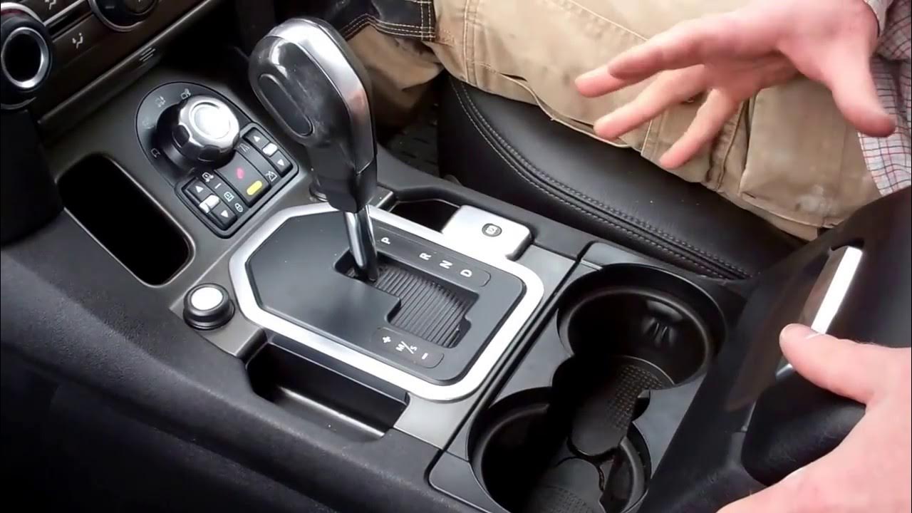 How to remove lower center console gear change on Land Rover Discovery