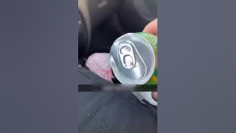 Soda can Sounds Funny and Explodes Inside car in guy