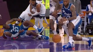 LeBron James is down grabbing at his ankle | Lakers vs T'Wolves