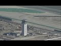 Government shutdown hits air travel, closing a control tower and causing delays across the country
