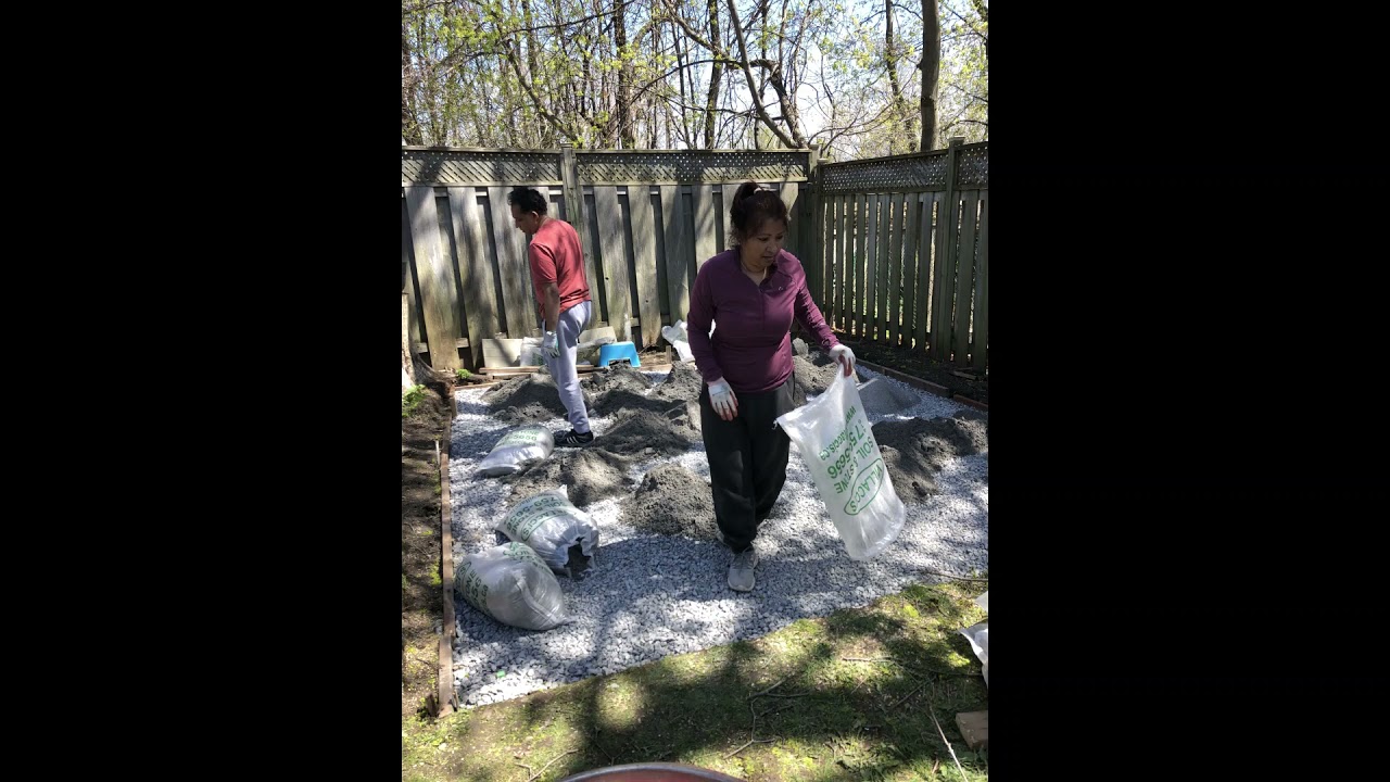 Backyard patio and laying patio slabs - YouTube
