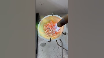 Melting scrap silver into an ingot