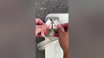 Adding a zipper pull to zipper tape