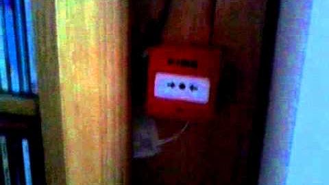 Smashing the glass on old style kac call point.2nd