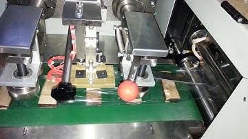 TCZB-450X horizontal flow packing machine down paper loading with double chain +pusher