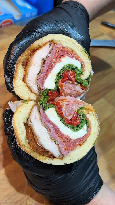 THE PAISANO from Panini Shoppe in Brooklyn NYC! 🇮🇹🥖 LOADED in the best way possible. #DEVOURPOWER