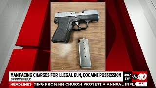 Firearms, cocaine seized after traffic stop