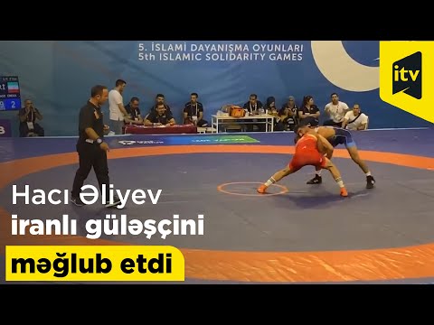 Hacı Əliyev iranlı güləşçi ilə görüşdə qərəzli hakimliyə baxmayaraq qələbə qazandı