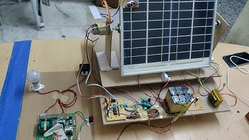 Dual-axis solar tracking system with UPS using PIC Microcontroller