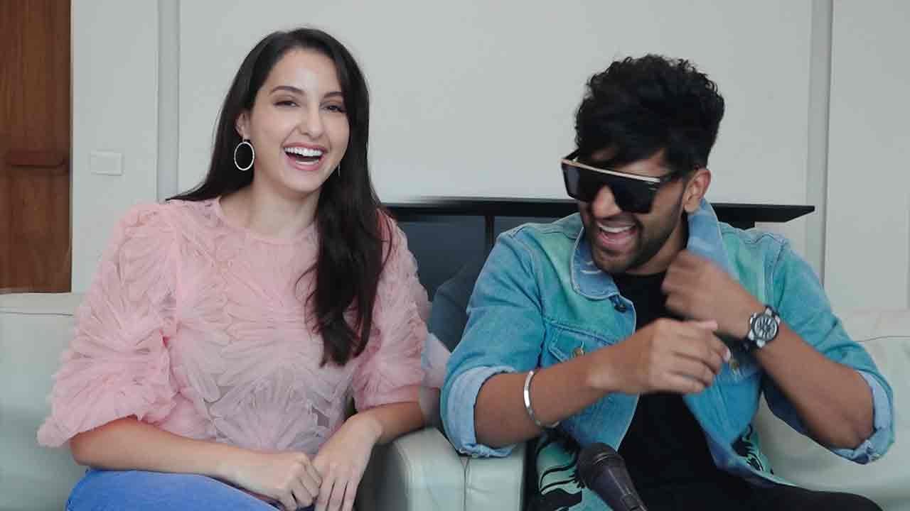 Guru Randhawa Feels Shy Sitting Next To HOTTIE Norah Fatehi In An Interview For Naach Meri Jaan Song