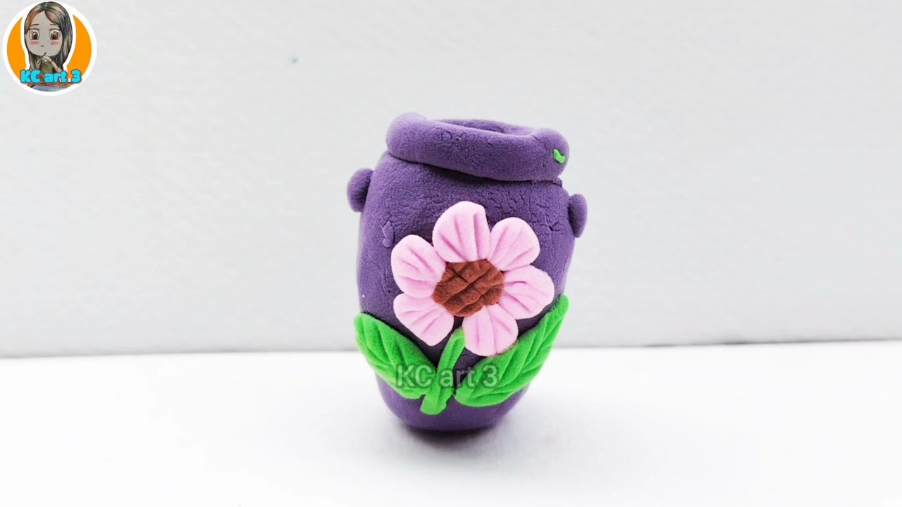 Đồ gốm sứ trong gia đình mĩ thuật lớp 5 - đồ gốm sứ trong gia đình lớp 5 - nặn lọ hoa bằng đất nặn