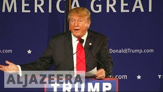 US appeals court upholds block on Trump travel ban