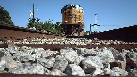 CSX Long Fast Train Cruises Over Camera