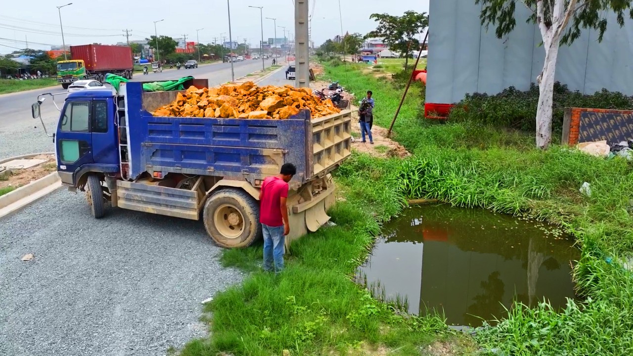 wonderful landfill project , dump truck transport soil stone , bulldozer komatsu d20p push soil