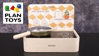 Plan Toys Portable Kitchen! All wooden playset! Includes spatula, pan, and stove! Stove doubles as a box! Watch as your child 