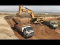 Caterpillar 365C Excavator Loading Trucks