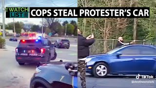 WATCH: Cops Retaliate & Drive Off With Protester's Car