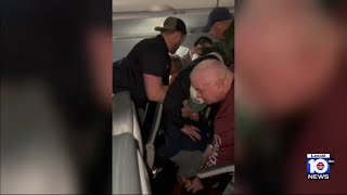 Man restrained after throwing punches, causing damage on Frontier Airlines flight