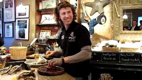 Patrick McMurray demonstrating his new oyster shuc...