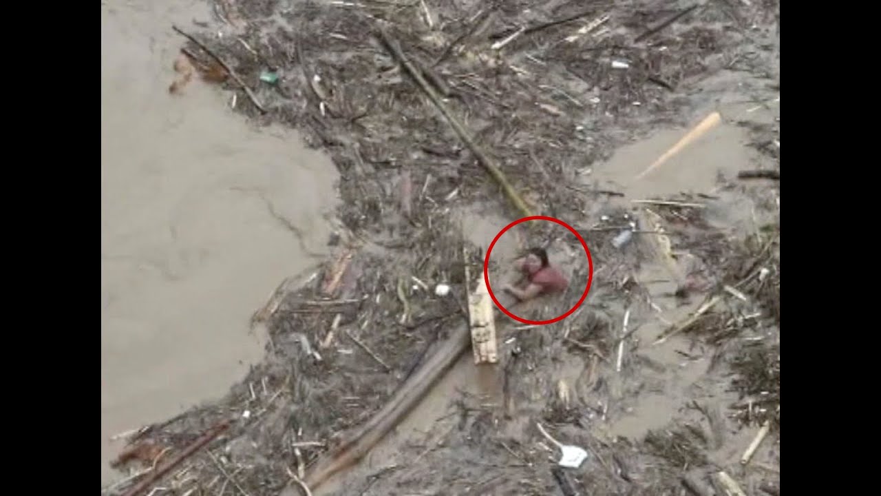 Woman Rescued after Drifting in Flooding River for An Hour - YouTube