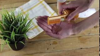 كيفية استخدام فرشاة الشعر لتوزيع الزيت