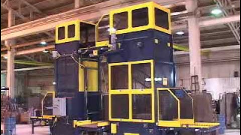 Omni Metalcraft Corp. Box Handling Continuous Vertical Conveyor Conveying