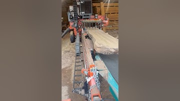 Woodmizer LT70 super wide with incline conveyor and transfer deck.  Cutting some nice black walnut