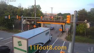 Rental truck crash debris hits innocent vehicle at the 11foot8+8 bridge