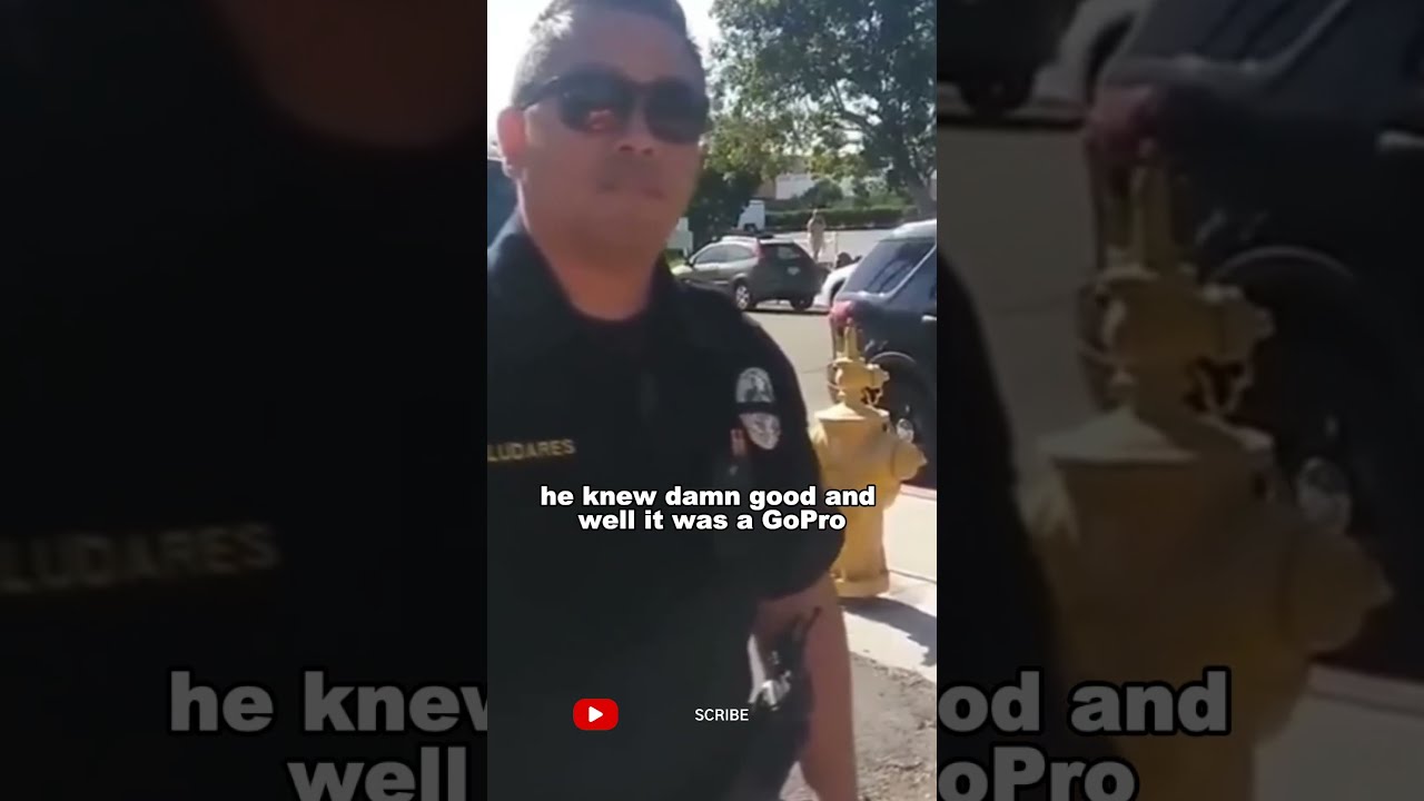 IDIOT COP Pulls Gun On Man With A Camera Cops Violating Civilians Rights COPS OWNED