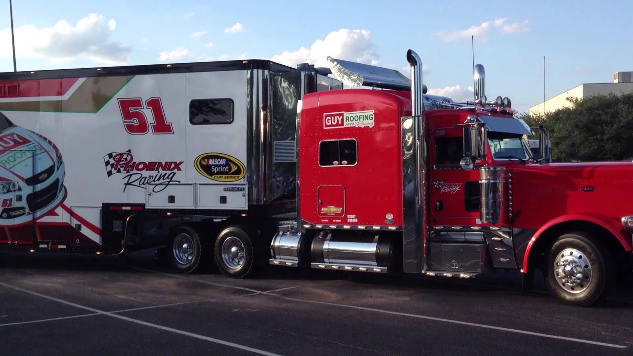 NASCAR Haulers Rolling out for Parade - YouTube