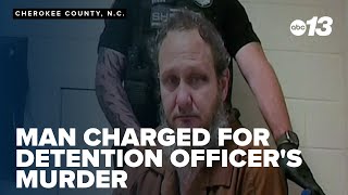 Man charged with murder after officer's shooting death
