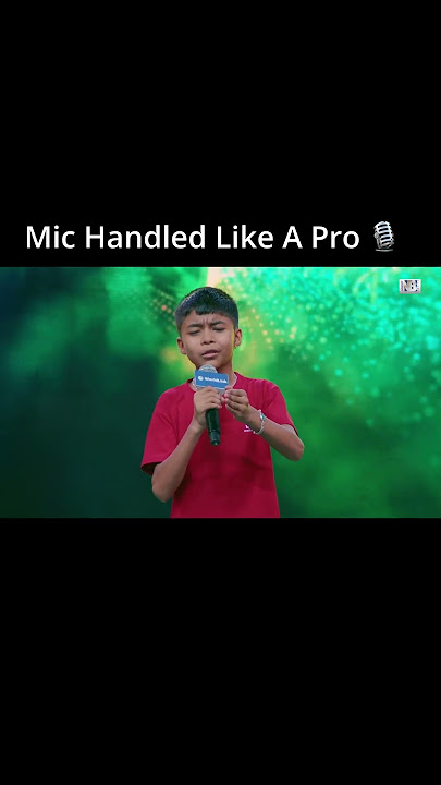 Mic in hand, confidence in voice,Rajesh lit up the stage with energy and flair!