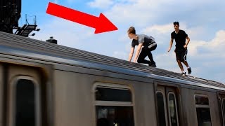 Teens ride on top of NYC trains