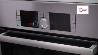 How do I activate and deactivate the oven child lock?
