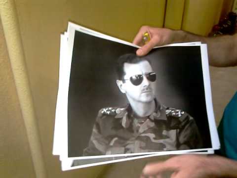 إثنين إحراق صور بشار الجحش بالرتب العسكرية
