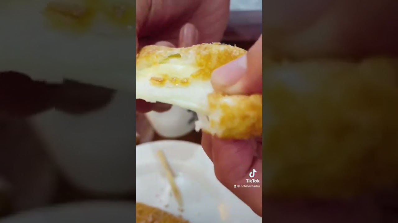 Trying cheesy rice corn dog for the first time 🧀