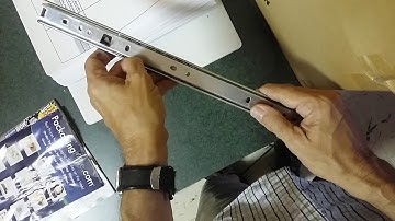 Keyboard tray rail removal