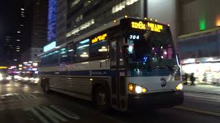 NYC Bus: SI Mall P&R bound D4500CT 2303 SIM8X at 34 St/7 Av (Reroute)