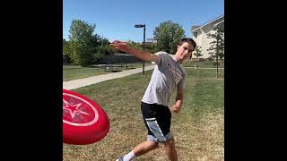 Throwing an Ultimate Frisbee Backhand (slow motion)