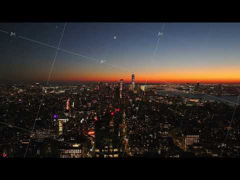 Crescent moon rises over Midtown Manhattan, New York City. Lights of skyscrapers are turning on as