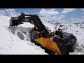 Volvo ec750e clearing snow in french alps