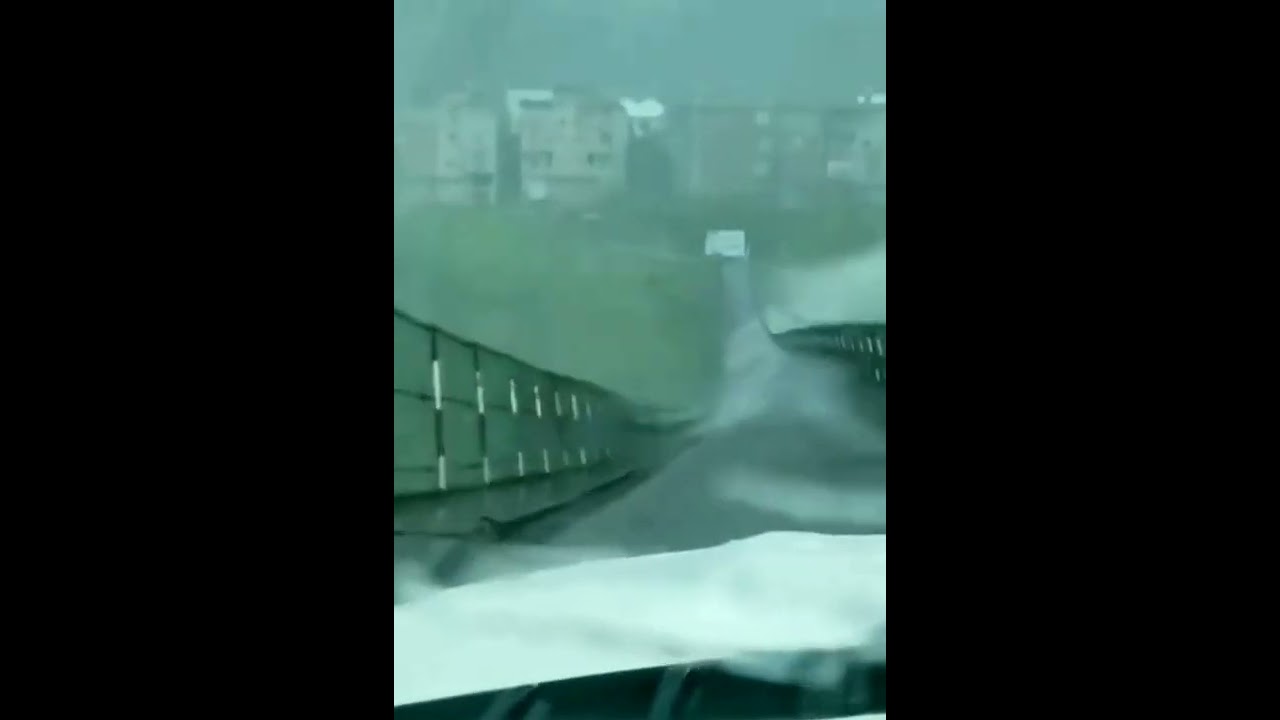 Cable bridge twists and turns during violent winds #short #weather