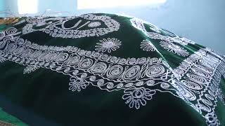 Егде жастағы әйелдің өскен көйлегінің фотосы