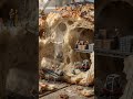 Workers assemble Bread Canyon Railway Project — Miniature Rail Construction & Cargo