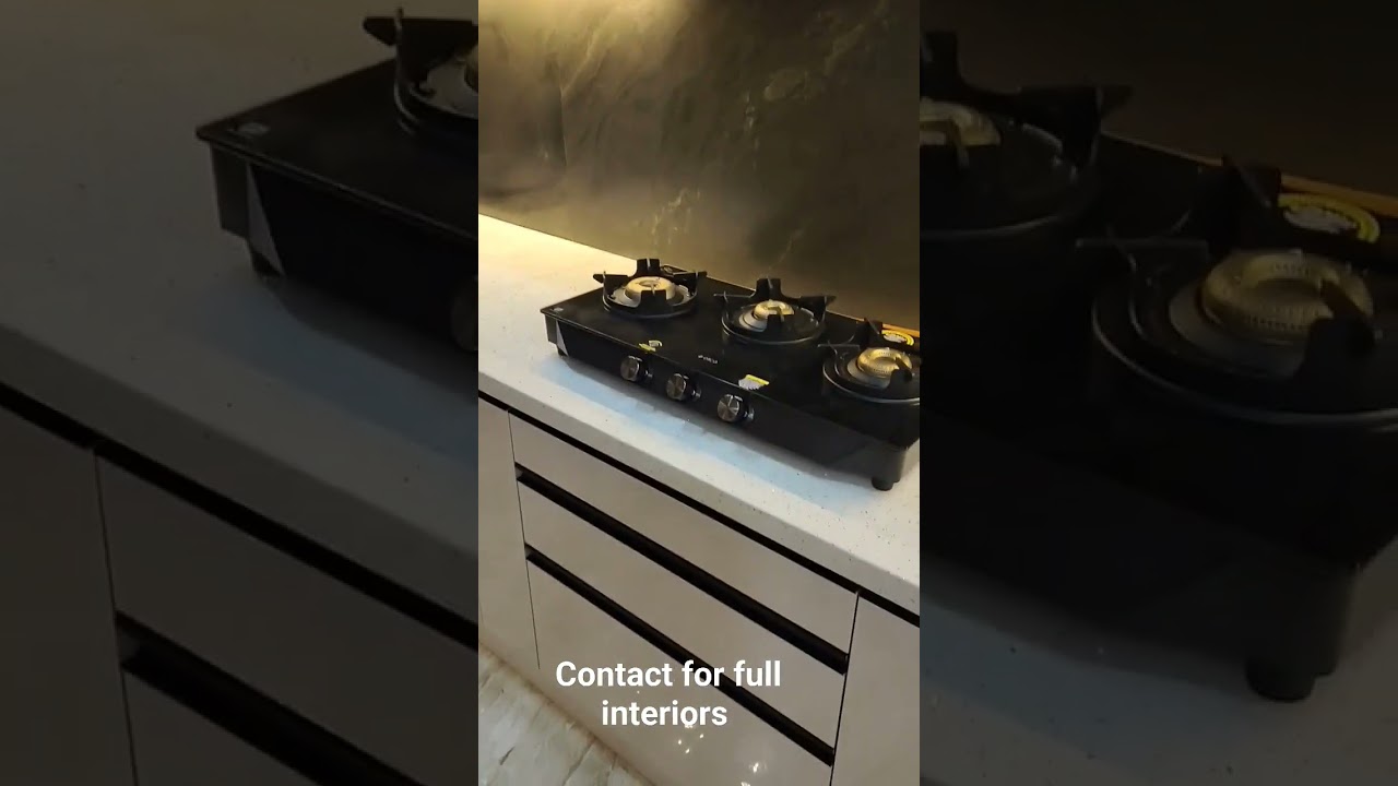 Small modular kitchen high gloss finish. 